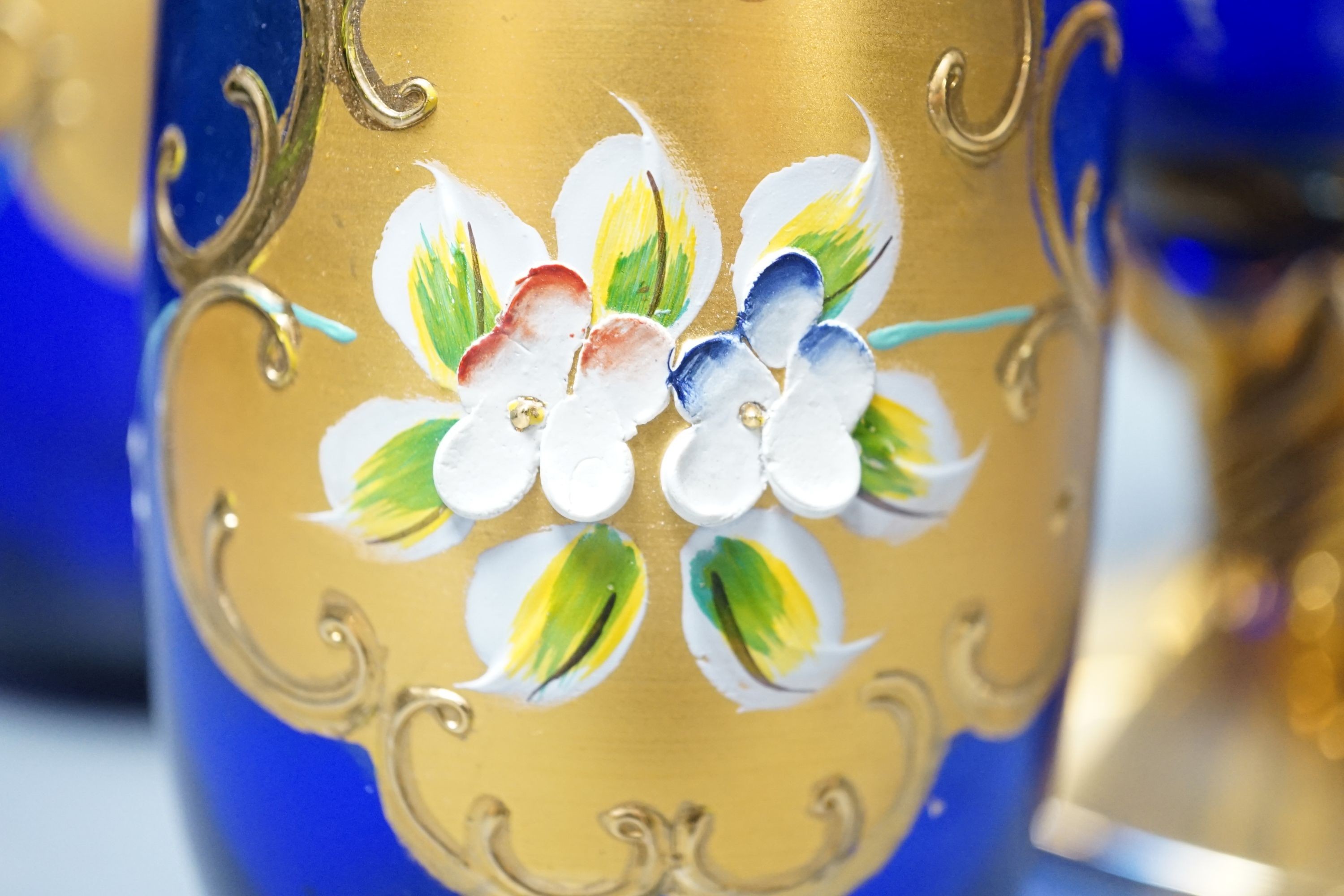 A collection of Venetian coloured and gilded glassware